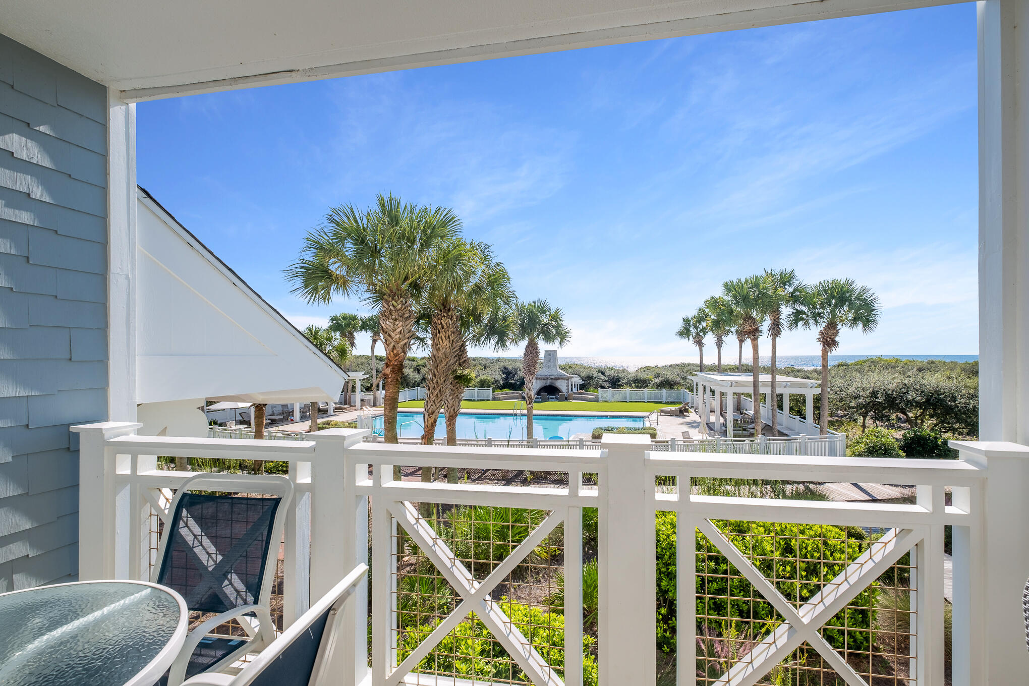 337 Bridge Lane, Unit 103B Inlet Beach, FL 32461 - Photo 6 of 37 a view of an chairs and table in patio