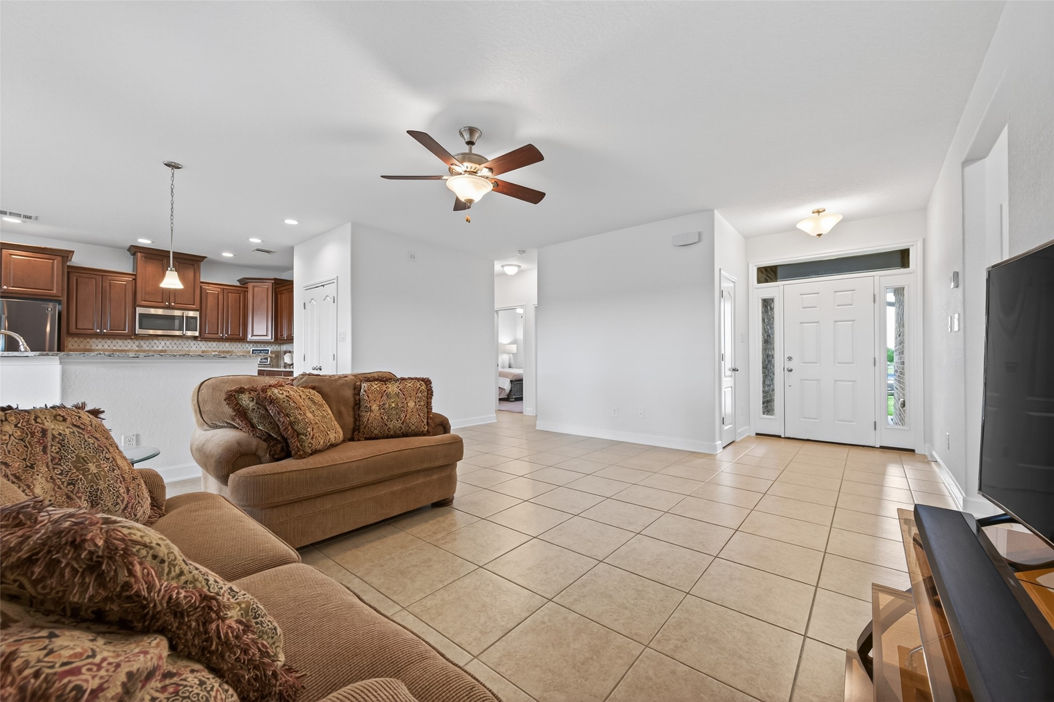 13506 Moody Road Needville, TX 77461 - Photo 6 of 36 Open concept entry and living room area with tile floors