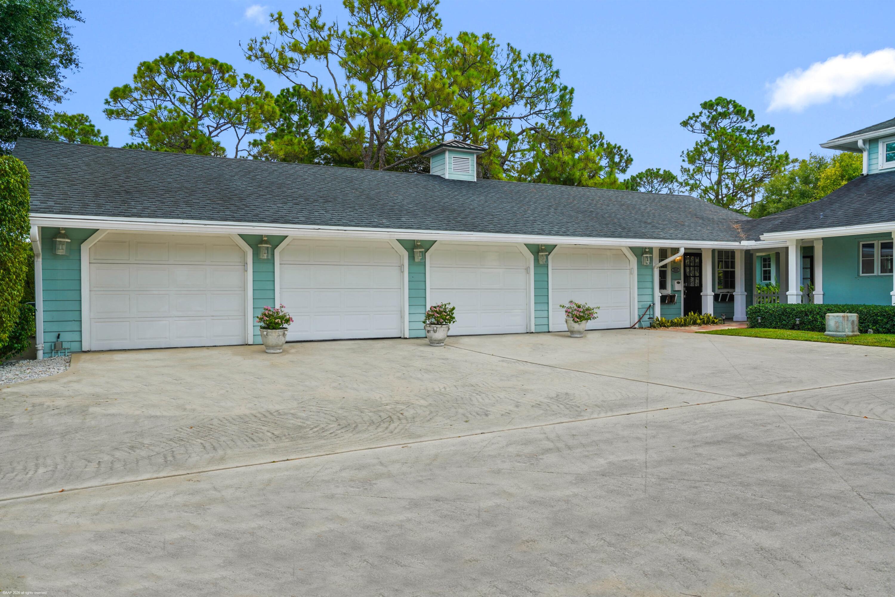 2740 Buck Ridge Trail Loxahatchee, FL 33470 - Photo 4 of 70 Four Car Garage