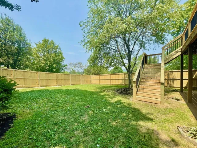 a view of an outdoor space and a yard