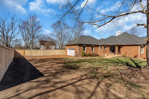 a view of kitchen with furniture and wooden floor