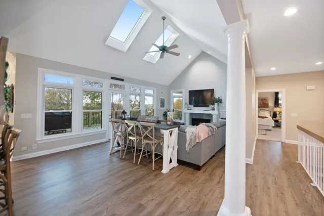 a view of a livingroom with furniture and wooden floor