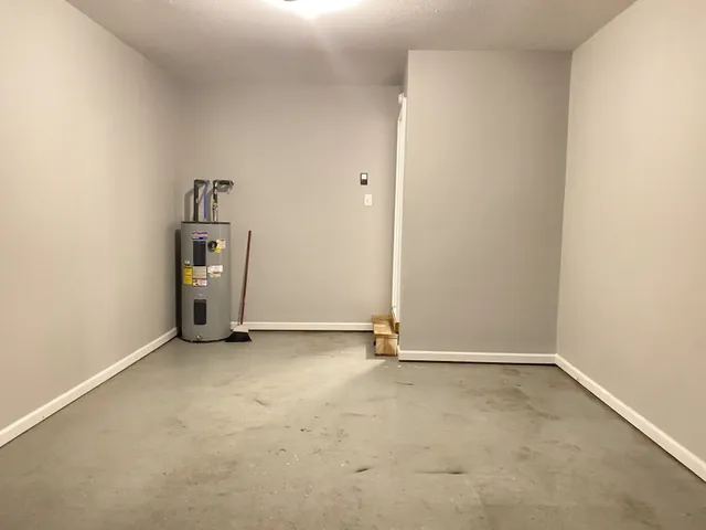 an empty room with a door