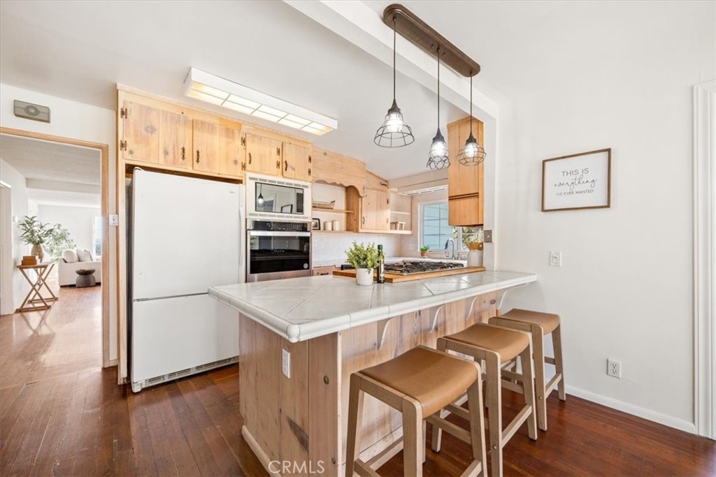 549 Derby Lane Paso Robles, CA 93446 - Photo 13 of 64 a kitchen with stainless steel appliances a refrigerator and a stove top oven