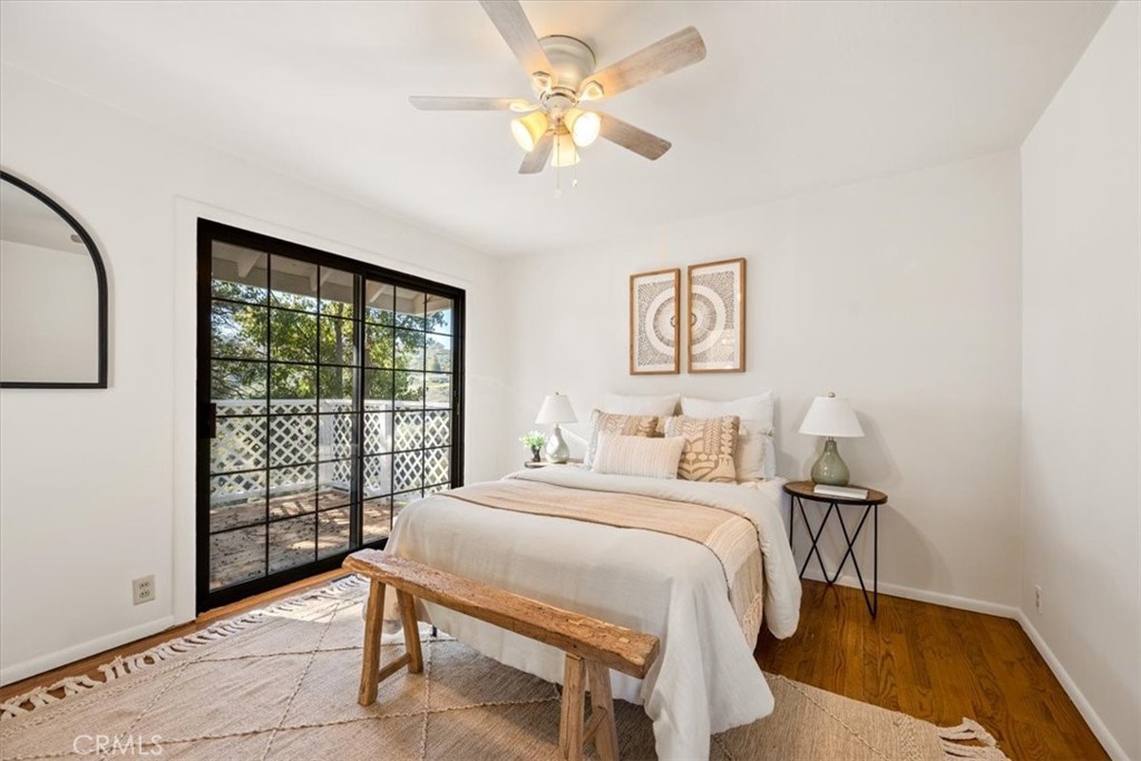 549 Derby Lane Paso Robles, CA 93446 - Photo 28 of 64 a bedroom with a bed and a large window