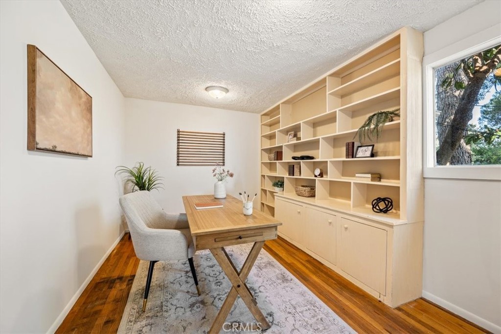549 Derby Lane Paso Robles, CA 93446 - Photo 32 of 64 a view of a workspace with furniture and a window