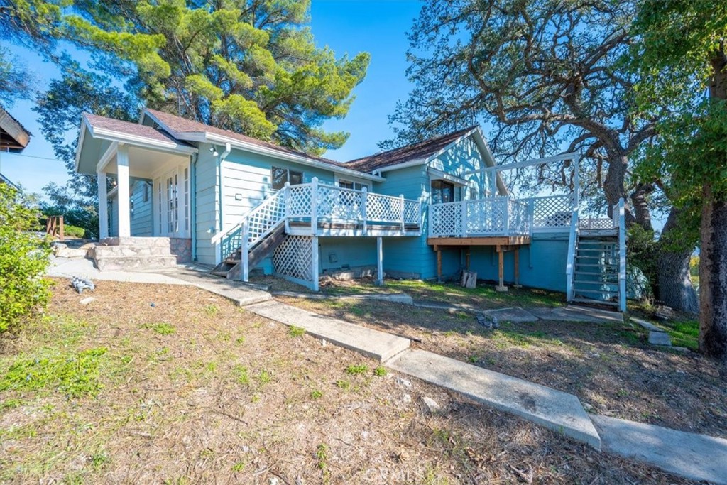 549 Derby Lane Paso Robles, CA 93446 - Photo 45 of 64 a front view of a house with a yard and garage