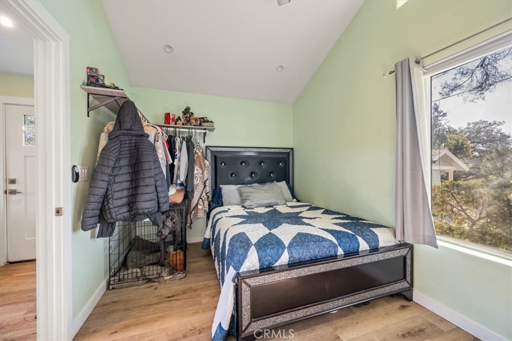 549 Derby Lane Paso Robles, CA 93446 - Photo 52 of 64 a bedroom with a bed and wooden floor