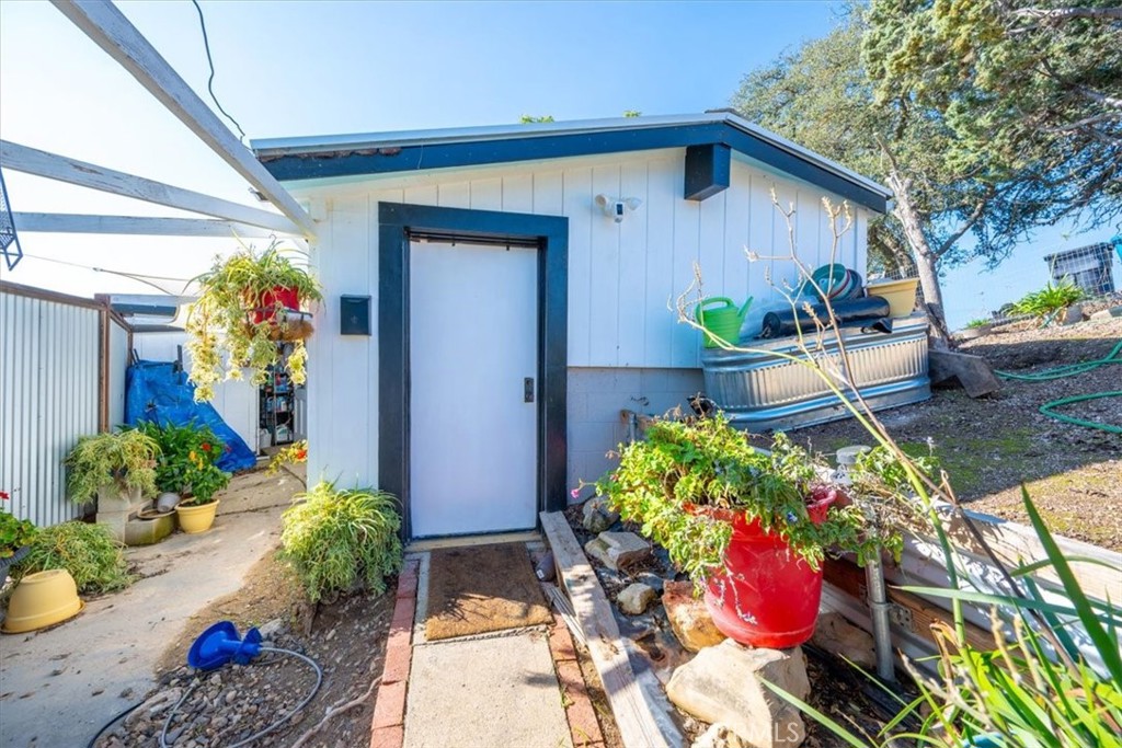 549 Derby Lane Paso Robles, CA 93446 - Photo 55 of 64 a front view of a house with outdoor seating