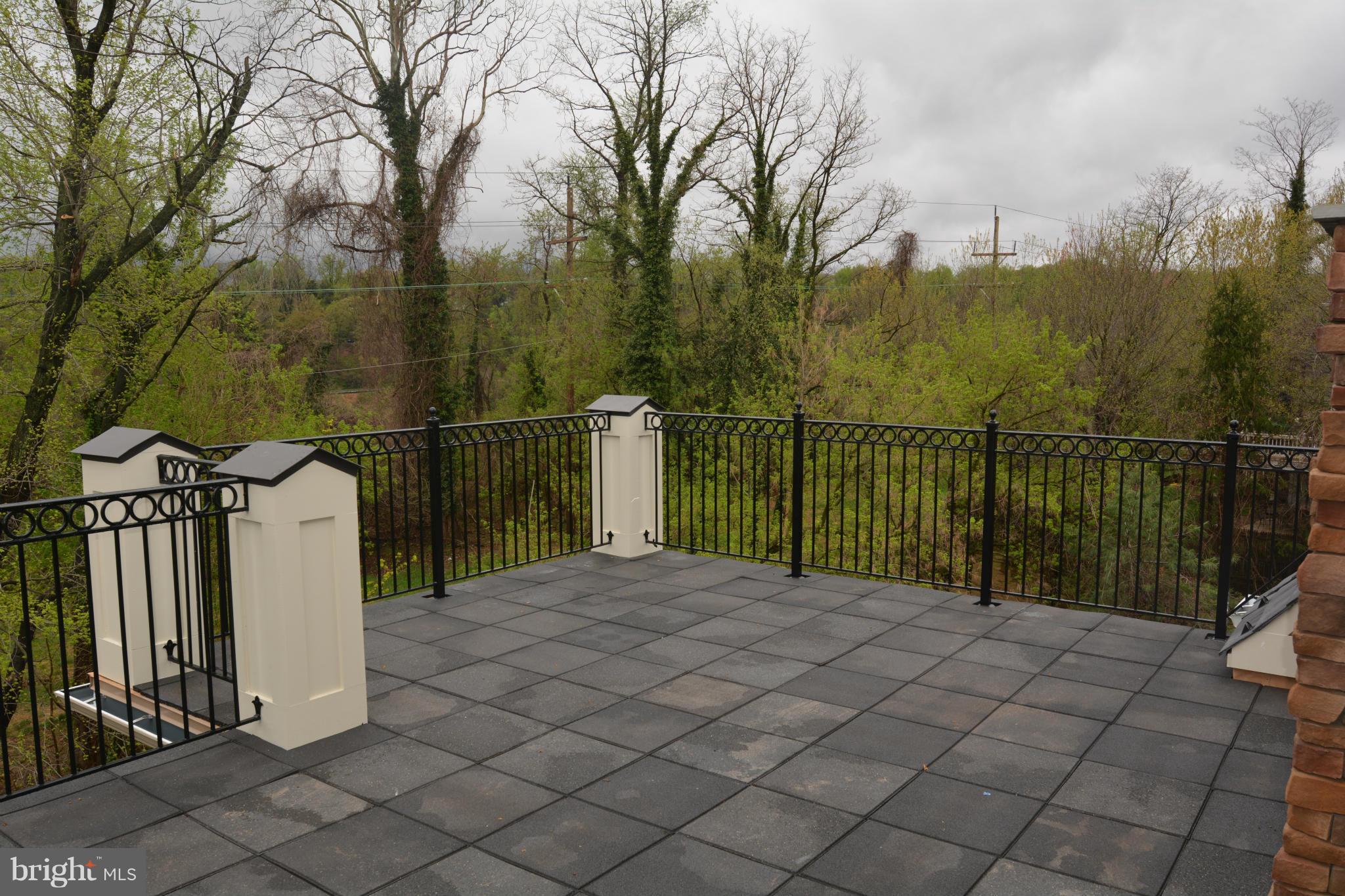 4526 Westhall Drive Washington, DC 20007 - Photo 20 of 20 a view of a pathway with a wrought fence