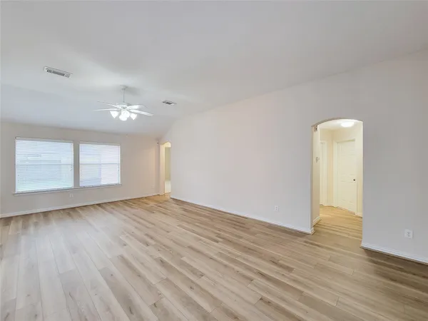 a view of an empty room and window