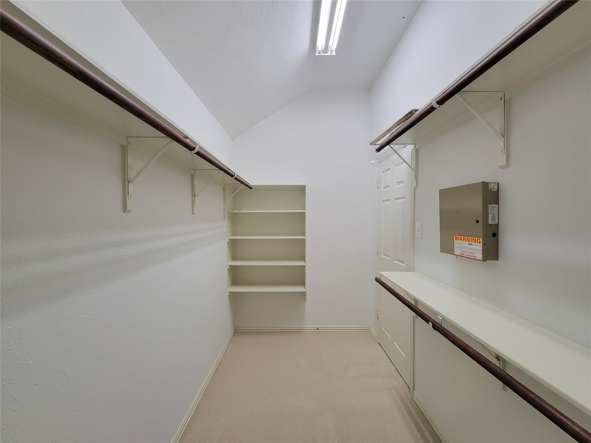 6806 Haley Court Pearland, TX 77584 - Photo 29 of 38 a view of storage and utility room with stairs and a window