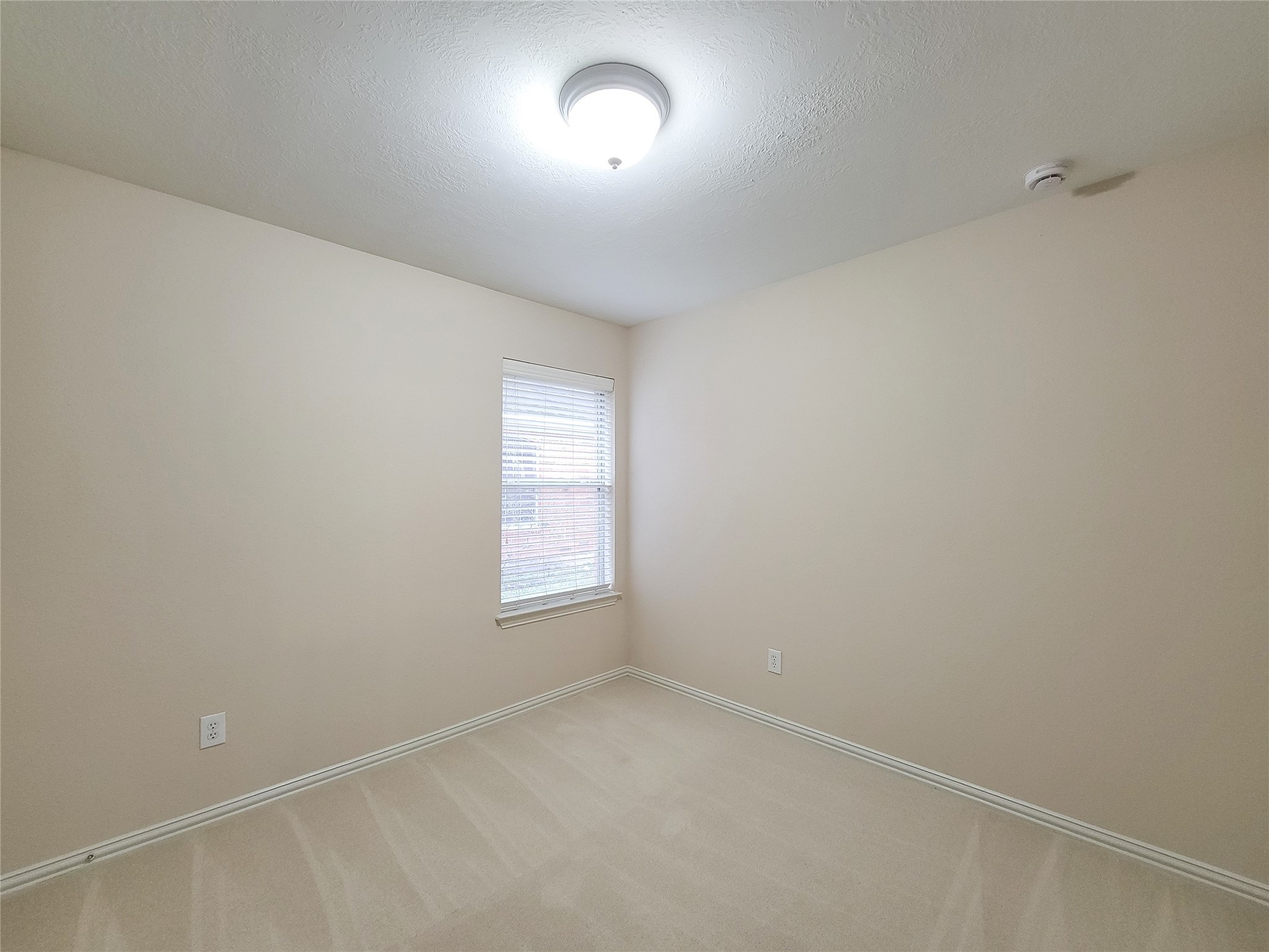 6806 Haley Court Pearland, TX 77584 - Photo 30 of 38 an empty room with a window and a mirror
