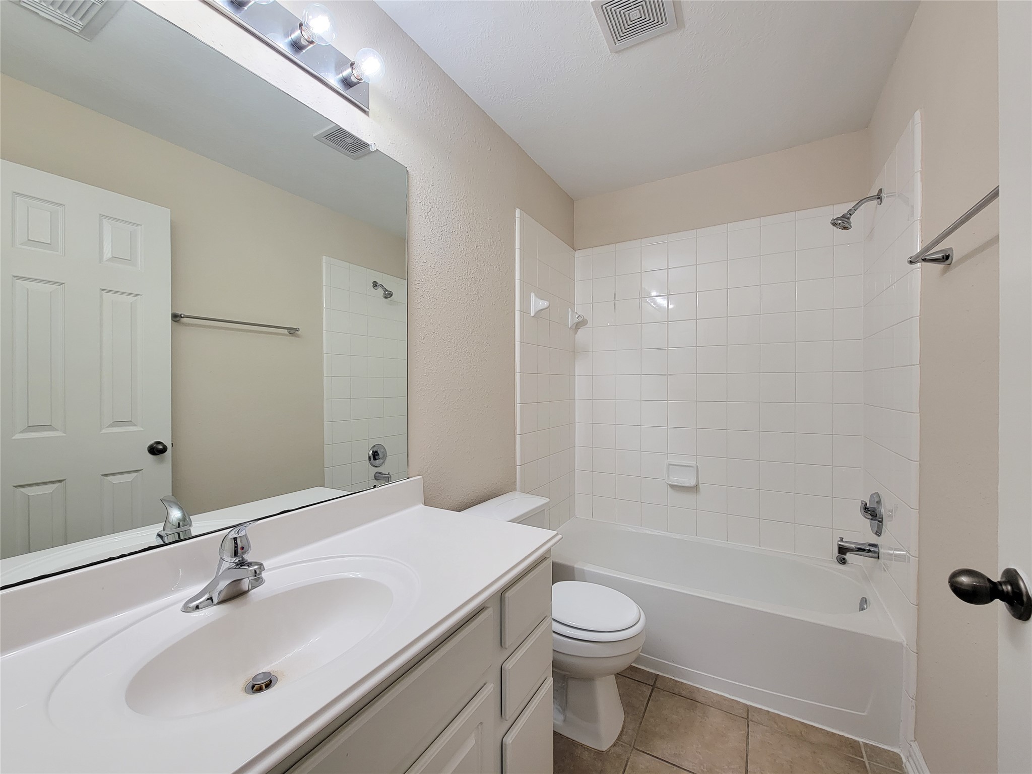 6806 Haley Court Pearland, TX 77584 - Photo 34 of 38 a bathroom with a bathtub shower sink vanity and toilet