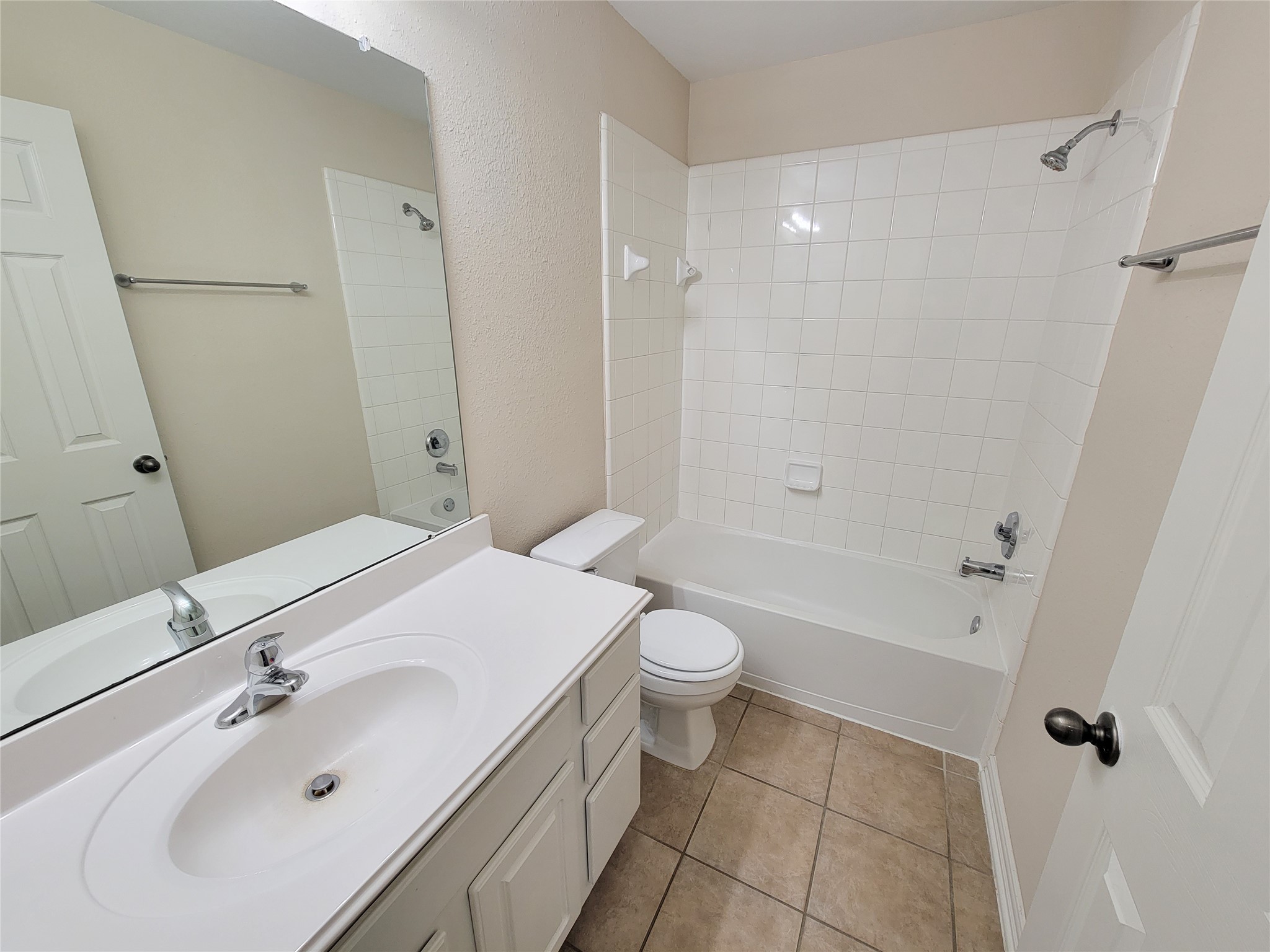 6806 Haley Court Pearland, TX 77584 - Photo 35 of 38 a bathroom with a sink a toilet and shower