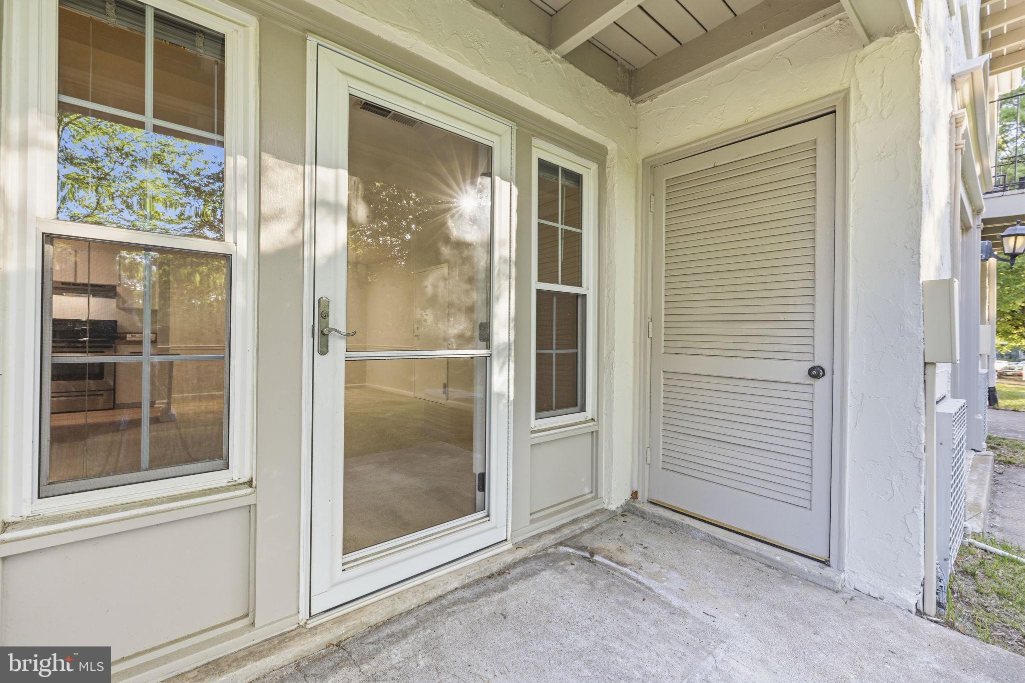 5817 Rexford Drive, Unit 798 Springfield, VA 22152 - Photo 17 of 23 a view of a glass door of the house