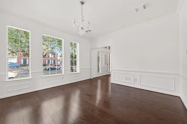 an empty room with a empty space and a window