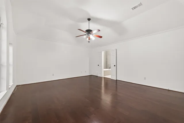 a bathroom with a toilet and a bathtub