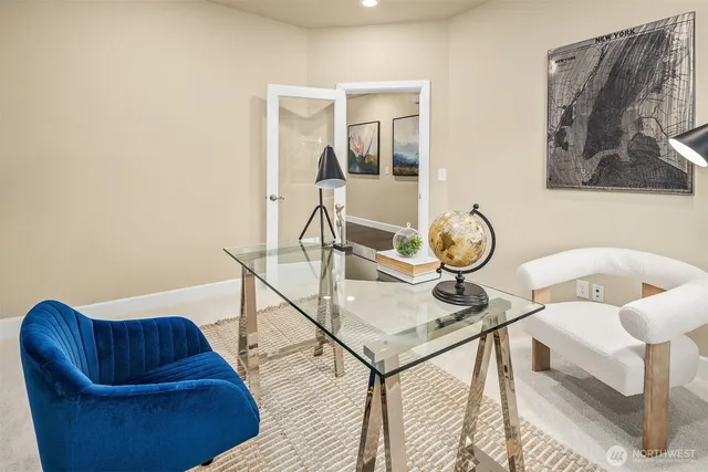 a view of a livingroom with furniture and a window