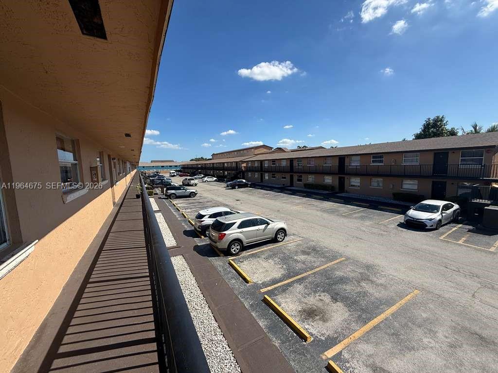 5491 West 24th Avenue, Unit 39 Hialeah, FL 33016 - Photo 2 of 12 a car parked on the side of the road