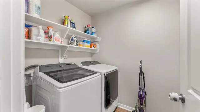 a utility room with dryer and washer