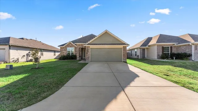 a view of house and garden with small yard