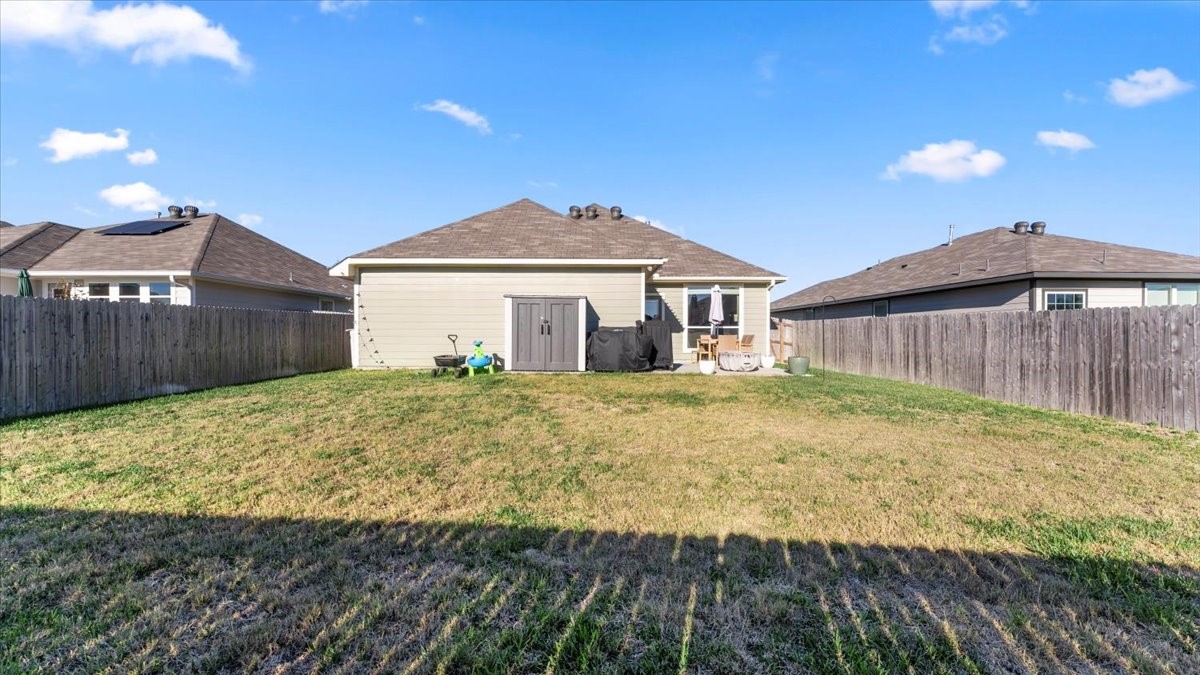 103 Rudder Way Huntsville, TX 77320 - Photo 31 of 35 a front view of a house with a yard