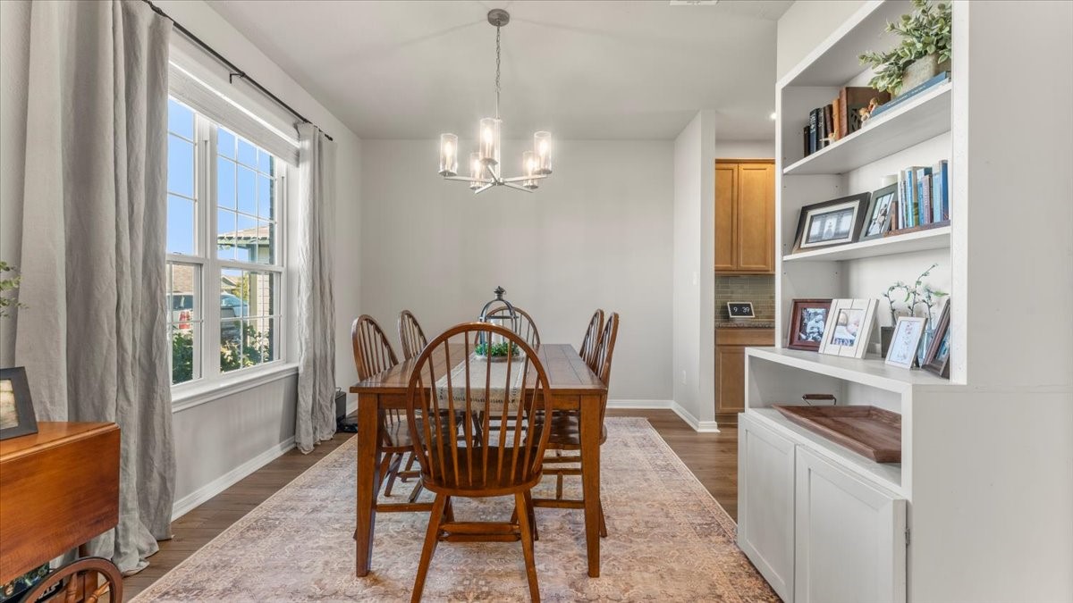 103 Rudder Way Huntsville, TX 77320 - Photo 5 of 35 a view of a dining room with furniture window and chandelier