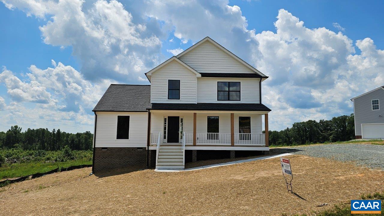 4305 Cedar Lane Road Kents Store, VA 23084 - Photo 1 of 27 a front view of a house with a yard