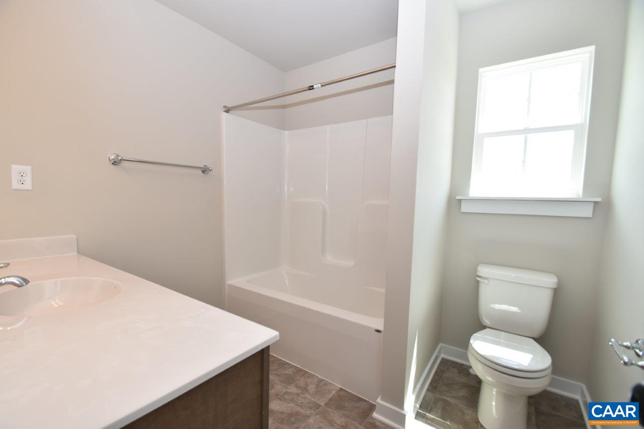 4305 Cedar Lane Road Kents Store, VA 23084 - Photo 3 of 27 a bathroom with a sink toilet and shower