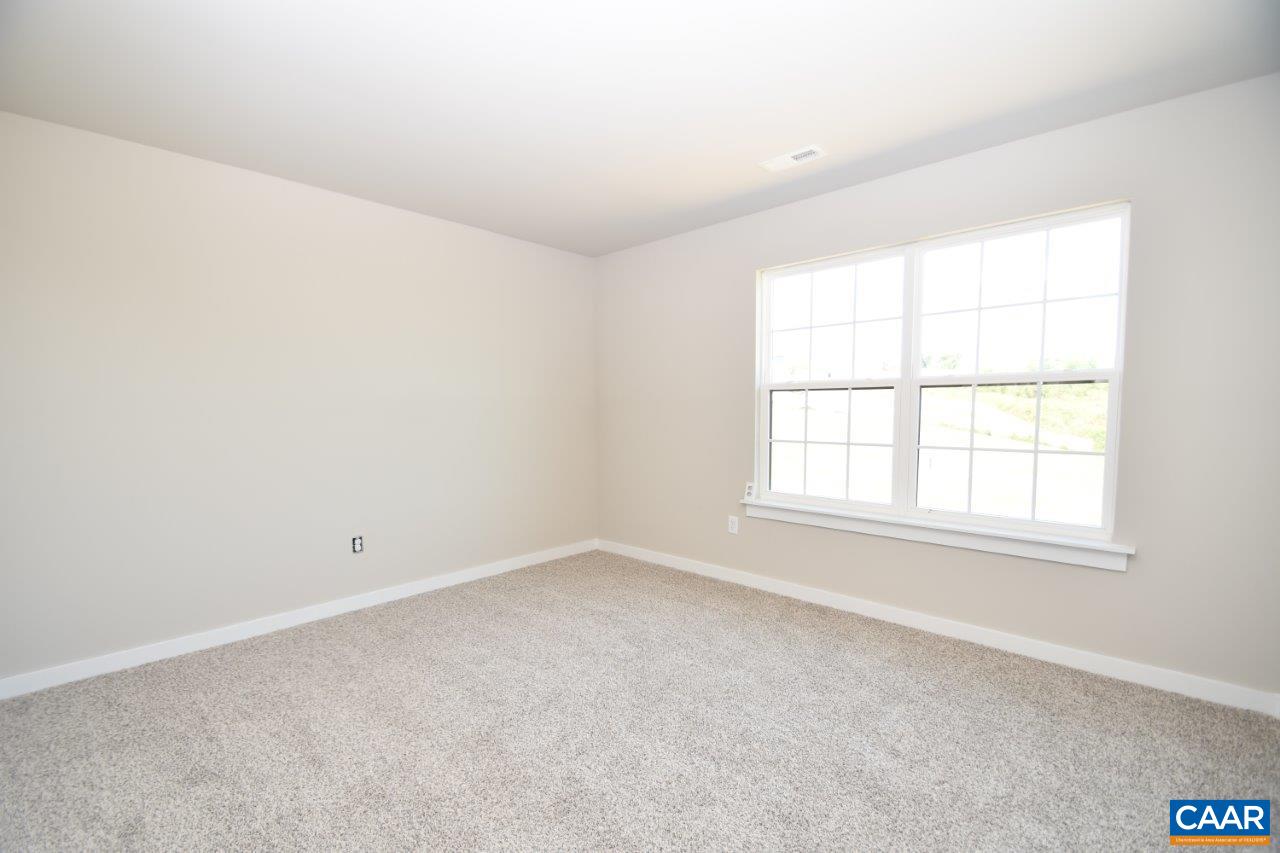 4305 Cedar Lane Road Kents Store, VA 23084 - Photo 5 of 27 an empty room with a window