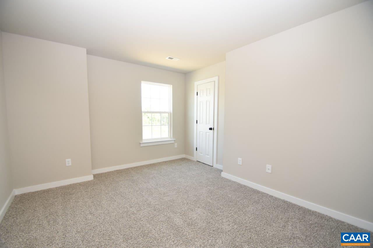 4305 Cedar Lane Road Kents Store, VA 23084 - Photo 6 of 27 a view of an empty room with a window
