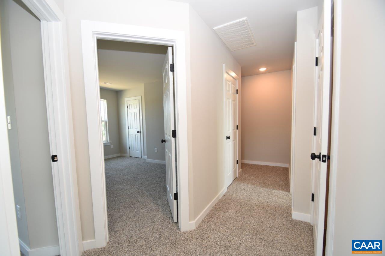 4305 Cedar Lane Road Kents Store, VA 23084 - Photo 7 of 27 a view of a hallway with three rooms