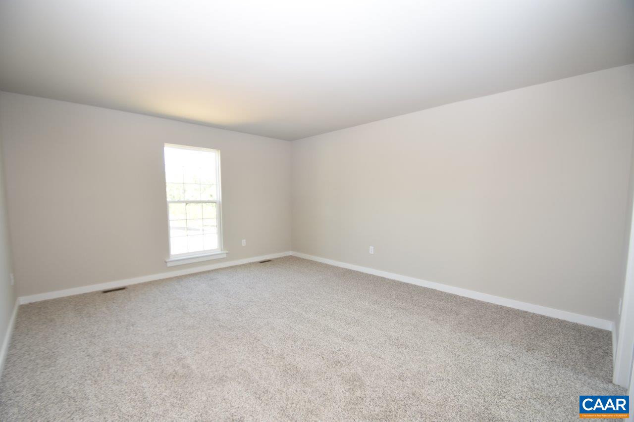 4305 Cedar Lane Road Kents Store, VA 23084 - Photo 9 of 27 an empty room with a window