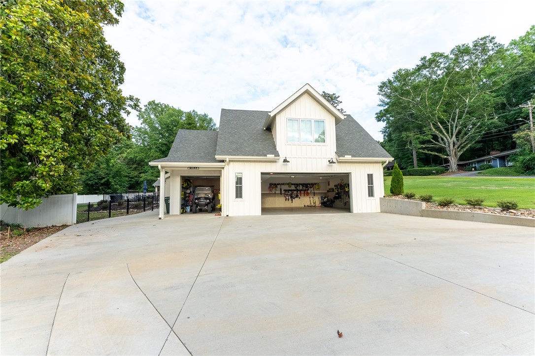 103 Riggs Drive Clemson, SC 29631 - Photo 50 of 50 A spacious detached garage building offers extensive storage and utility with an additional upper-level window.