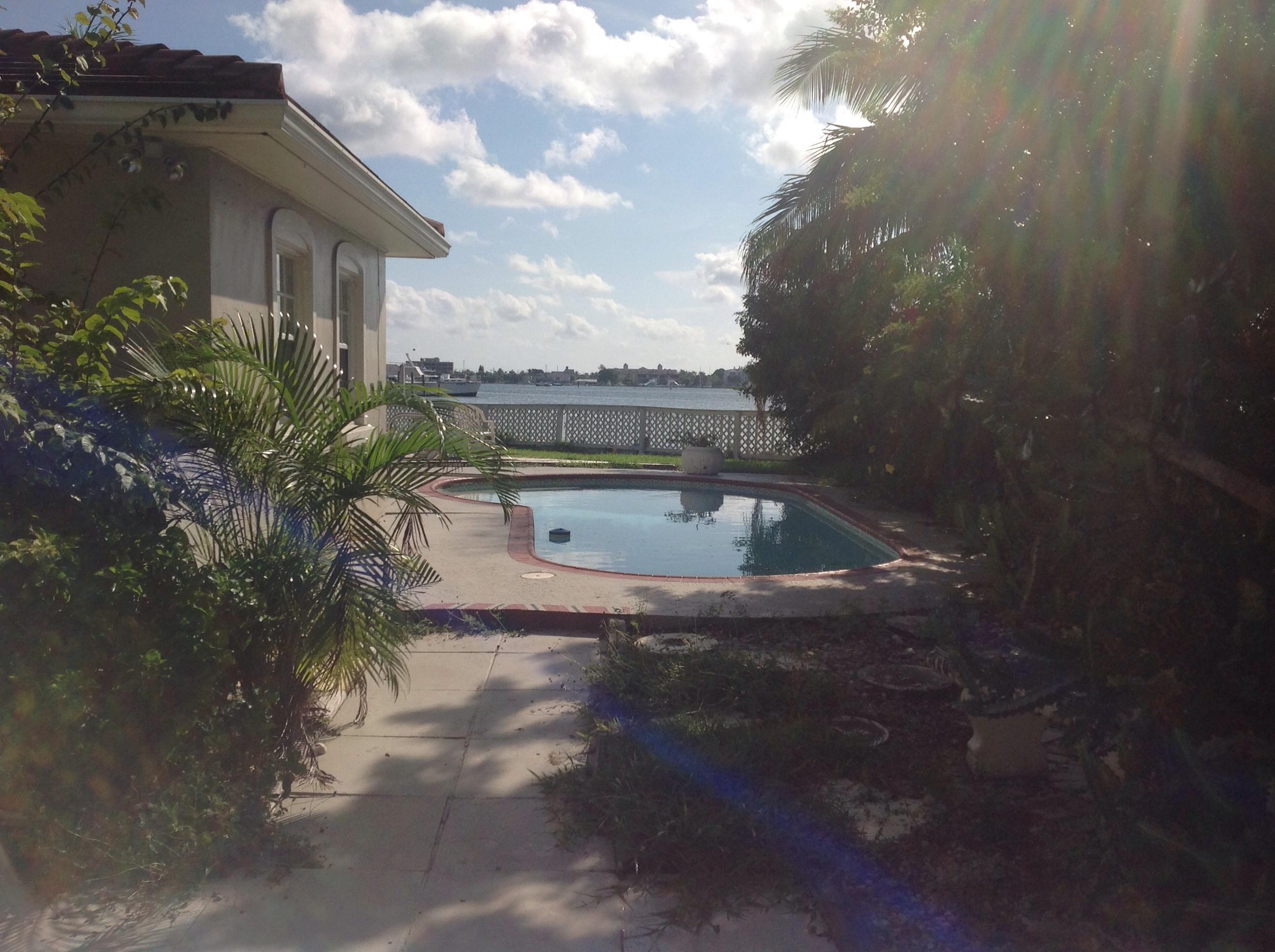337 East 25th Street Riviera Beach, FL 33404 - Photo 2 of 7 a view of swimming pool from a lake view
