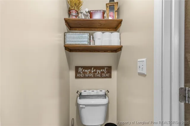 a bathroom with a shower and a mirror