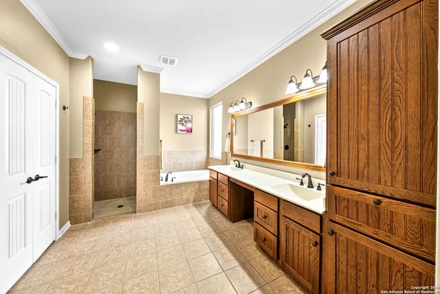 a bathroom with a sink a toilet and a bathtub