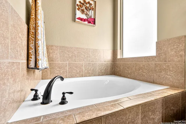 a view of a lake with a house in the background