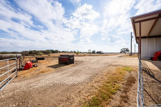 a view of swimming pool with seating space