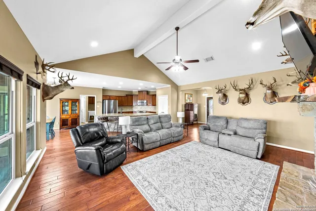 a kitchen with granite countertop a sink and a stove