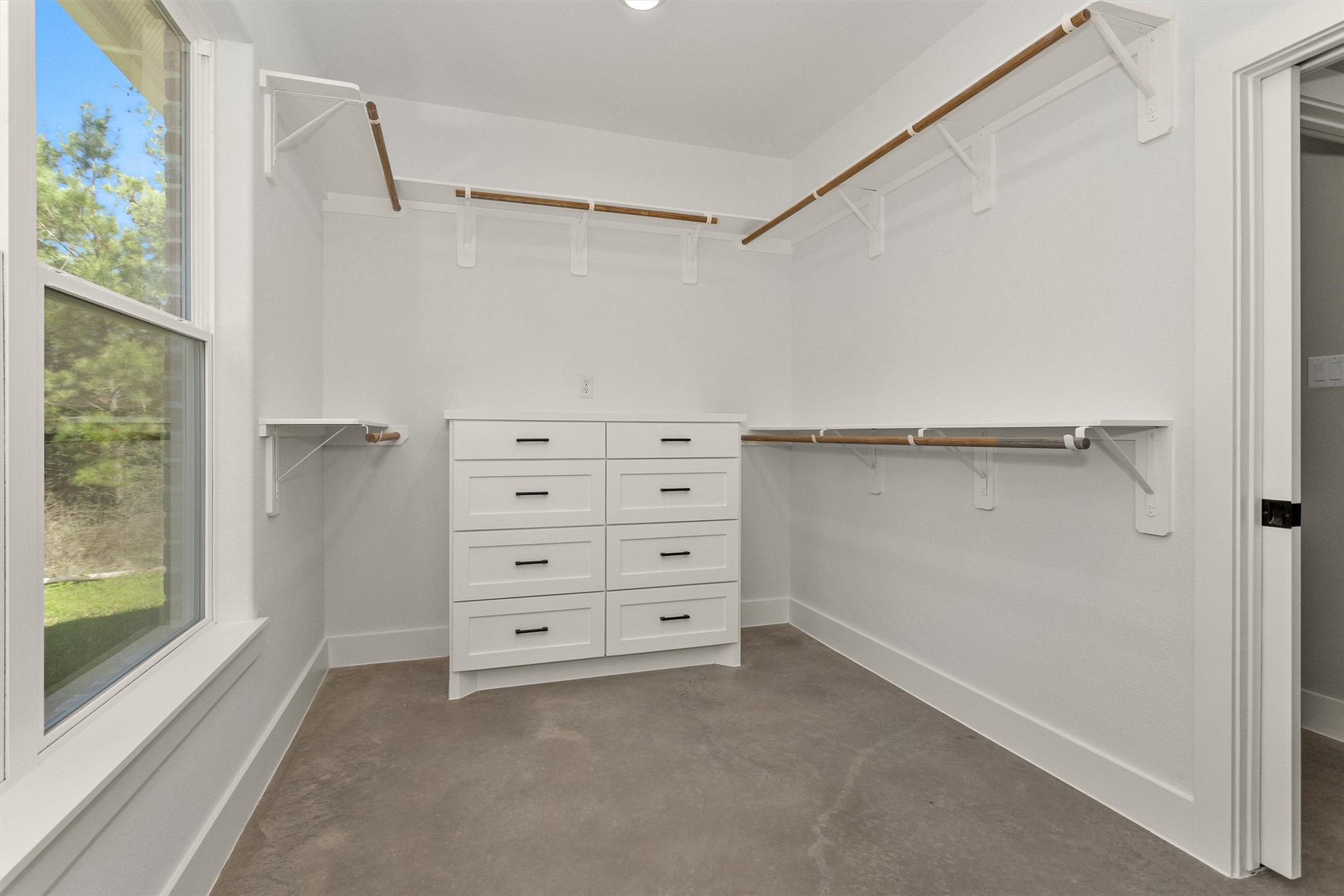 12744 Oak Barrel Road Willis, TX 77378 - Photo 30 of 50 Combining functionality with comfort, this well-appointed closet offers both ample storage and a touch of luxury.