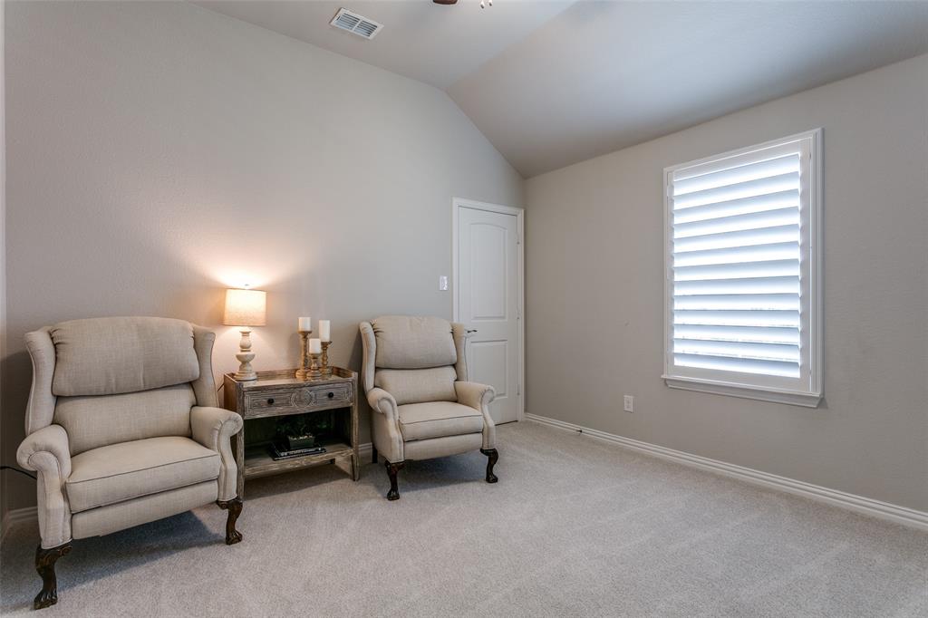 1801 Wichita Drive Prosper, TX 75078 - Photo 29 of 36 a living room with furniture and a window