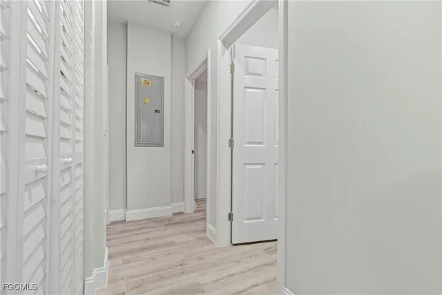 a view of a bathroom with wooden floor