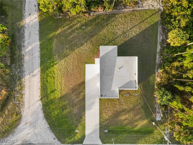 aerial view of a residential houses with outdoor space