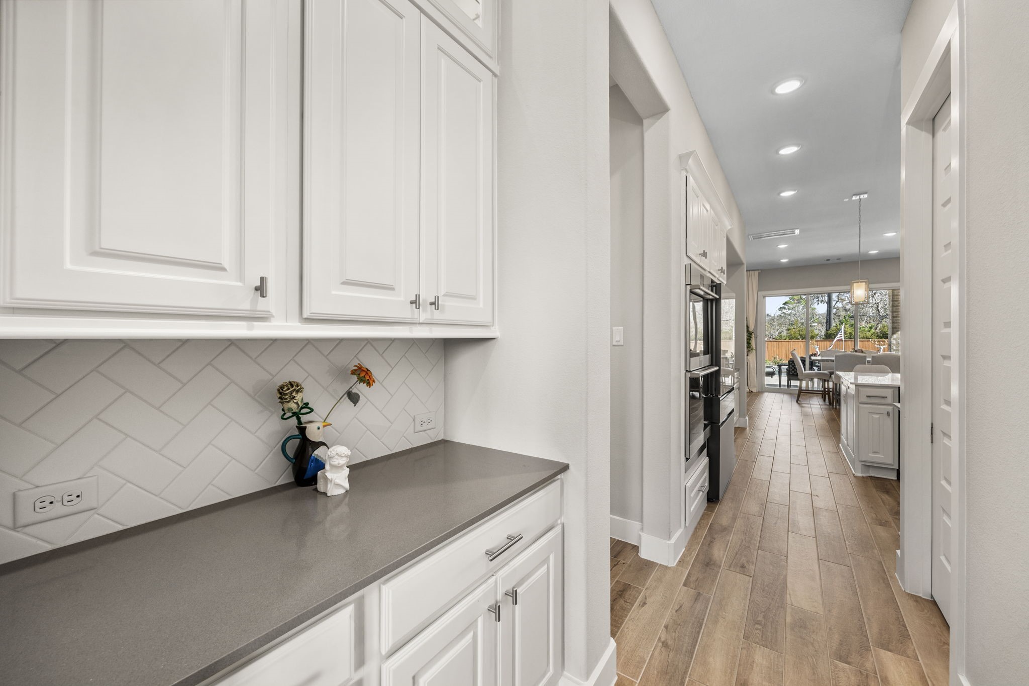 29402 Cir S Rnch Trail Fulshear, TX 77406 - Photo 19 of 50 a kitchen with a sink and cabinets