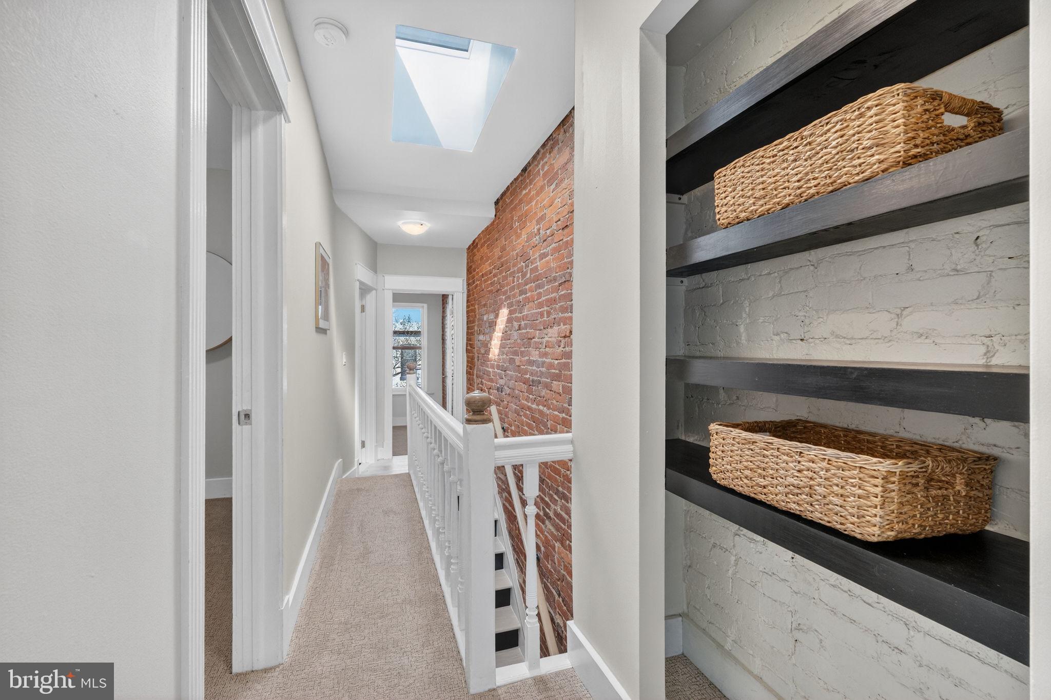 654 Acker Place Northeast Washington, DC 20002 - Photo 21 of 38 Upstairs Hall with Linen Closet