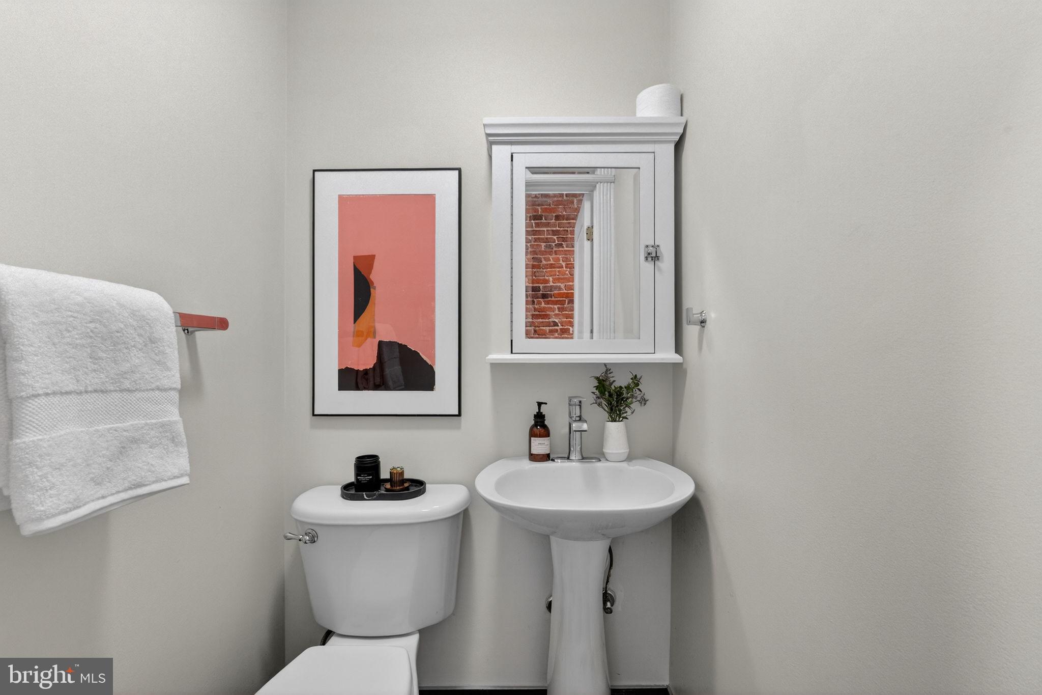 654 Acker Place Northeast Washington, DC 20002 - Photo 10 of 38 Powder room on main level