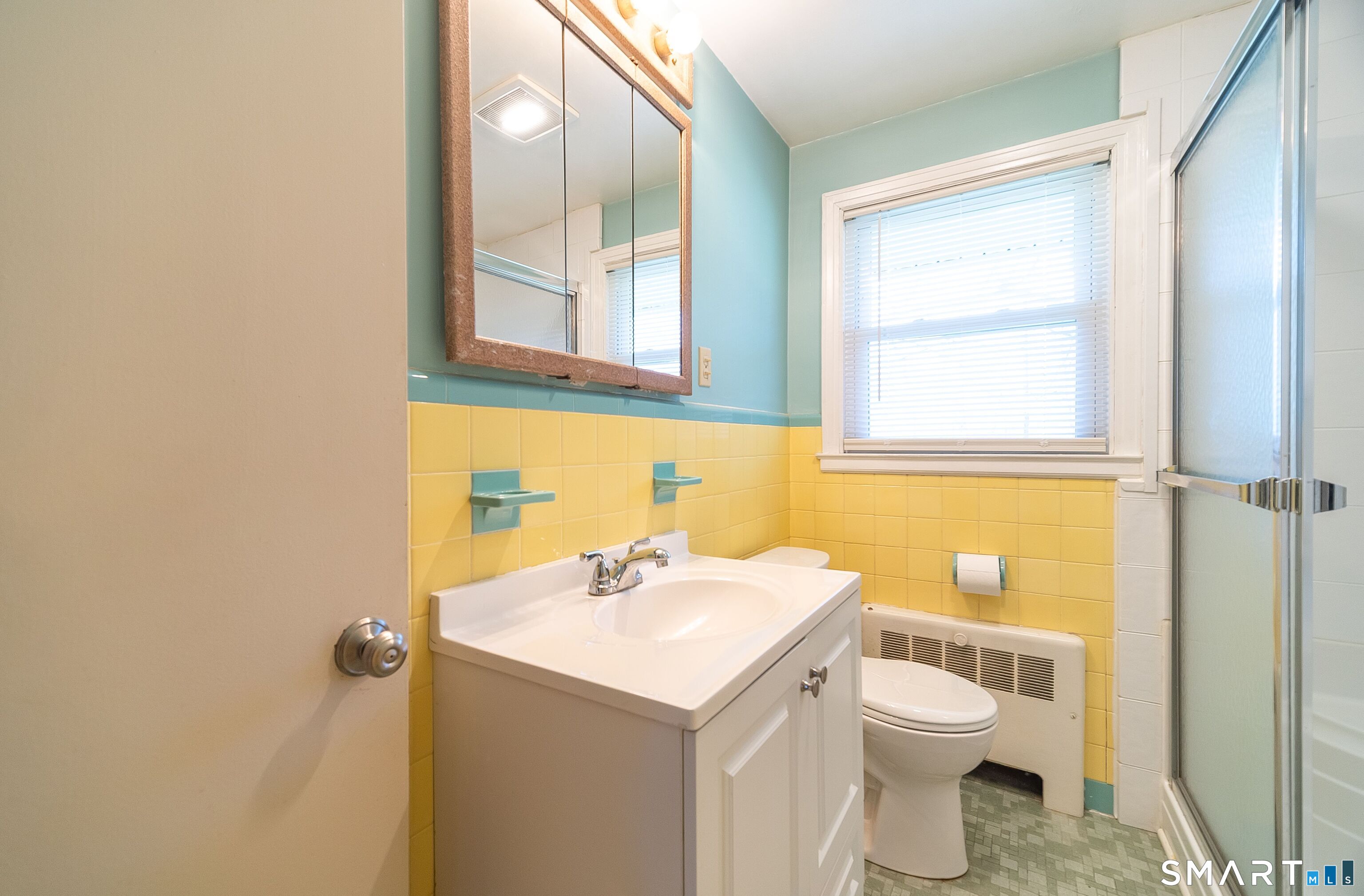16 Featherbed Lane Branford, CT 06405 - Photo 17 of 40 a bathroom with a sink toilet and vanity