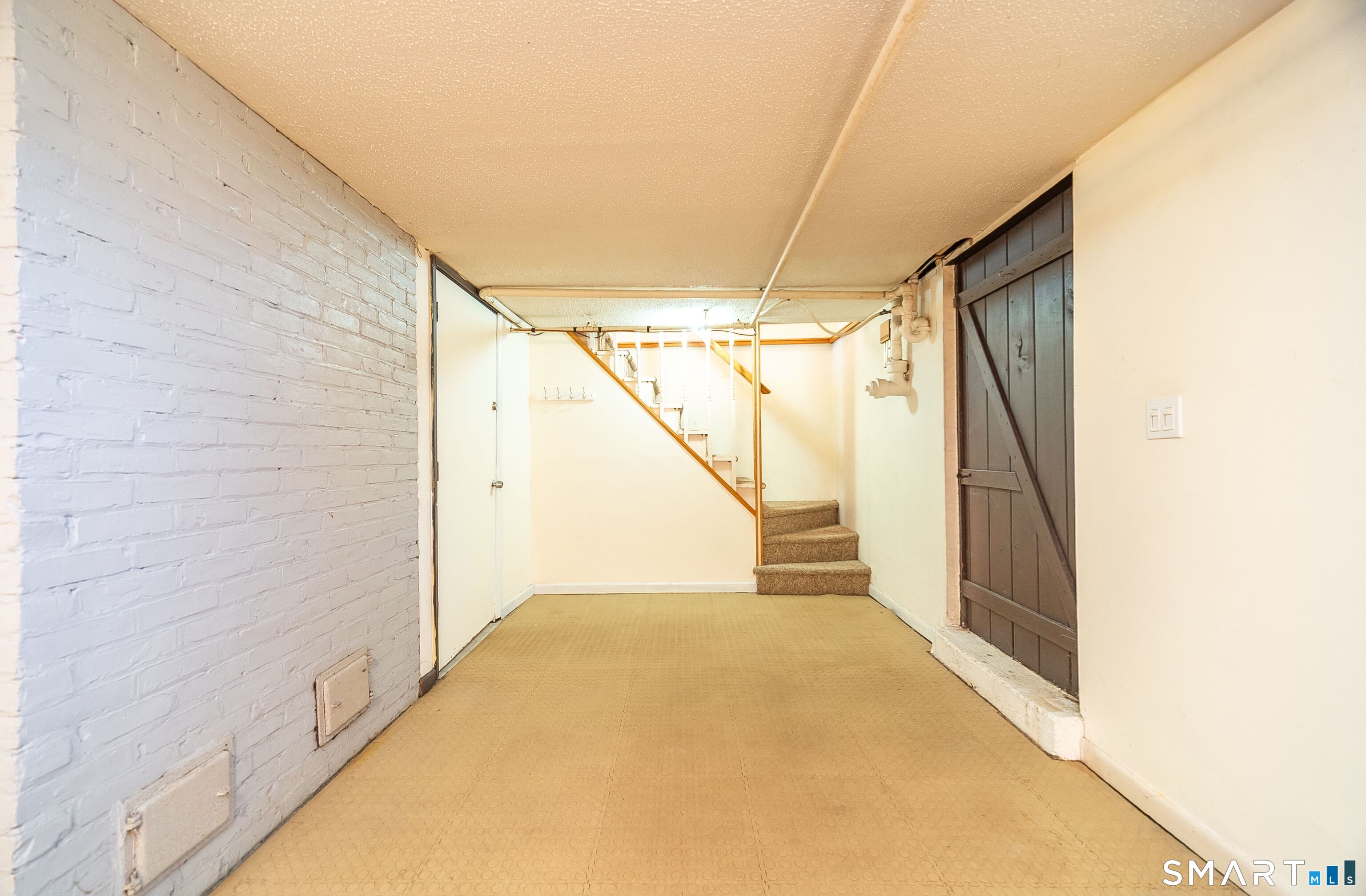 16 Featherbed Lane Branford, CT 06405 - Photo 26 of 40 a view of hallway with stairs